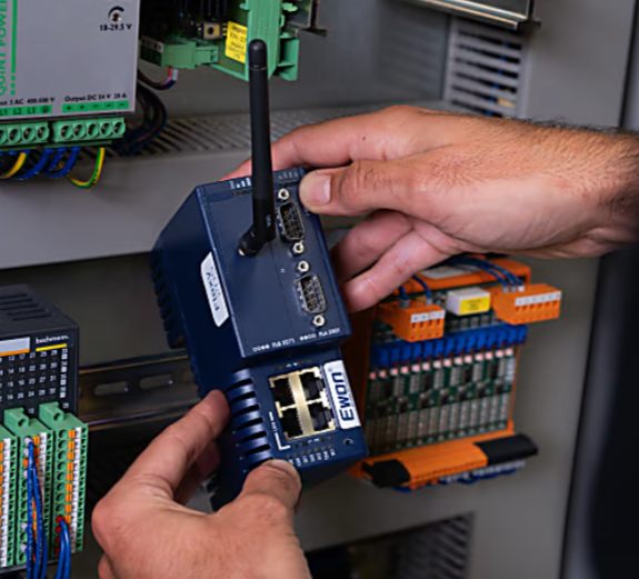 Ewon Flexy 205 gateway DIN rail mounted in control panel for remote machine data access