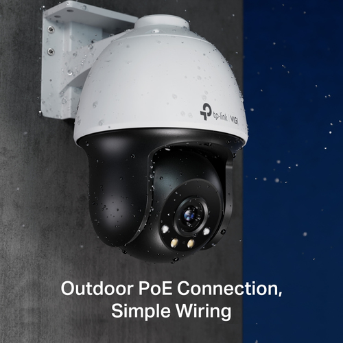 TP-Link VIGI 4MP outdoor pan tilt IP camera installed on wall monitoring driveway