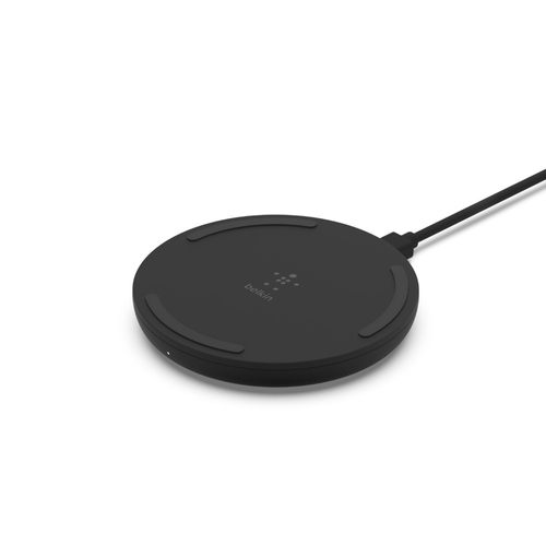 Belkin WIA001BTBK wireless charging pad black image charging smartphone on desk