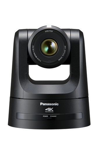 Panasonic AW-UE100KEJ 4K PTZ camera mounted in a boardroom showing 24x optical zoom and 81.8° field of view