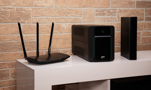 APC Back-UPS 1600VA protecting home computer and electronics setup