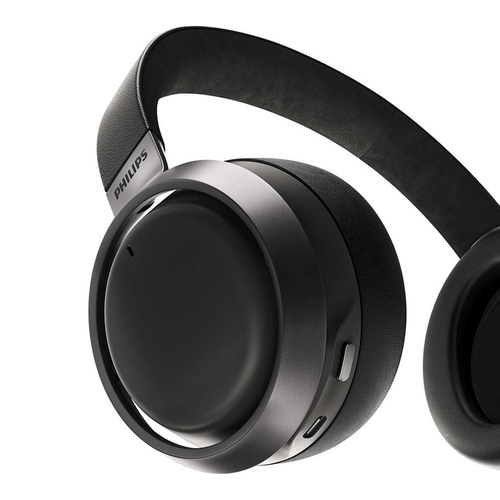 Philips Fidelio headphones demonstrating foldable design and touch control buttons