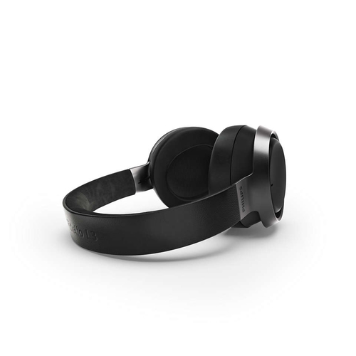 Philips Fidelio headphones worn by user for immersive music listening experience