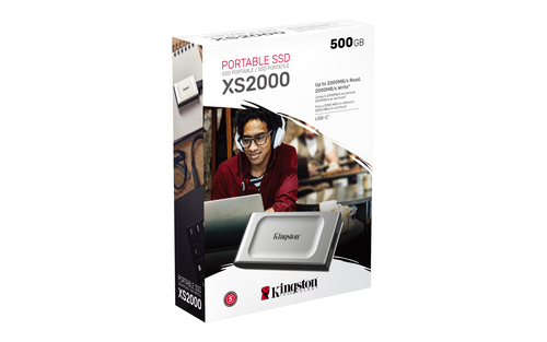 Kingston XS2000 500GB USB C portable SSD connected to laptop for fast 2000MB s file transfer