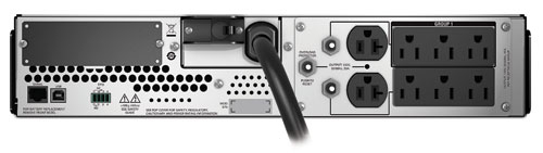 Rear view of APC SMT3000RM2U UPS showing NEMA 5–15R and 5–20R outlets