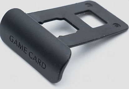 Teal game card slot cover for Nintendo Switch Lite gaming console