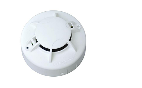Attom Agile View M-S-SF smoke sensor top view showing white housing, mounting tabs, and test button