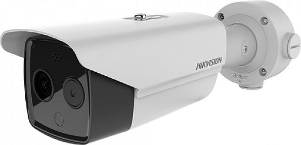 Hikvision DS-2TD2617B-6/PA thermographic bullet camera mounted on a white ceiling, showing temperature screening view