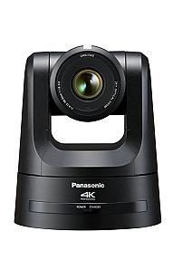 Panasonic AW-UE100KEJ 4K PTZ camera mounted in a boardroom showing 24x optical zoom and 81.8° field of view